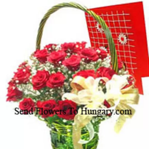 Canasta de 25 rosas rojas con una tarjeta de felicitación gratis