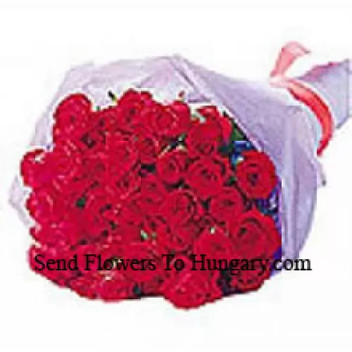 Bouquet magnifiquement emballé de 25 roses rouges